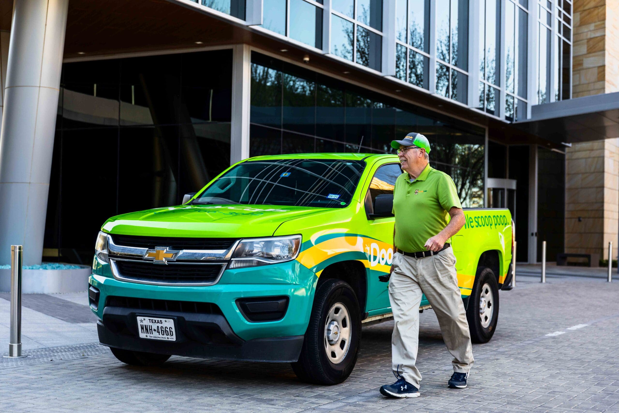 DoodyCalls technician walking around truck