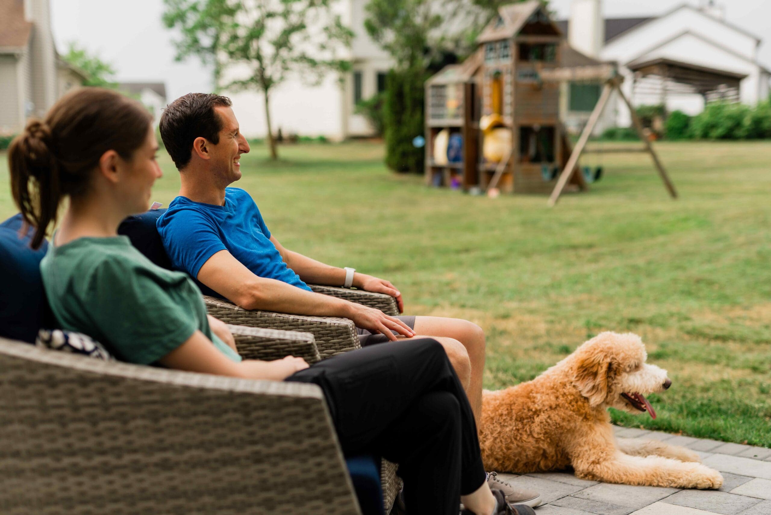 family outside with dog